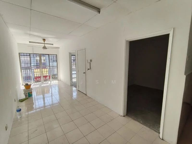 Room features: white painted walls, tile flooring, ceiling fan, large windows, doorway to adjacent room, light fixtures, empty space, visible plumbing fixtures.
