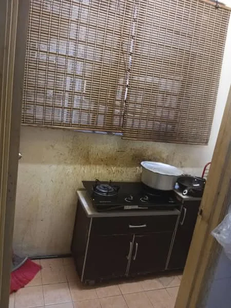Kitchen features: brown wooden cabinetry, gas stove with three burners, stainless-steel pot, tile flooring, bamboo blinds, dirty walls, sink, countertop, wall-mounted shelf.