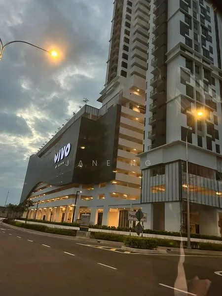 Exterior type: high-rise condominium; features: glass curtain wall, white painted facade, projecting balconies, feature lighting at night, approximately 20-storey high-rise, manicured landscaping, street view, signage visible, modern architectural design; style: modern.