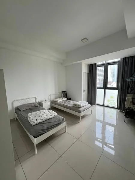 Bedroom features: two single beds with grey bedding, white metal bed frames, floor-to-ceiling windows, grey curtains, white painted walls, glossy tile flooring, built-in wardrobe, chair, natural light from window; style: modern; view: city.