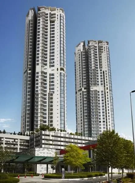 Exterior type: high-rise condominium; features: glass curtain wall, white painted facade, recessed balconies, landscaped garden at base, manicured lawn, mature trees, multiple storeys, modern architectural design; style: modern.
