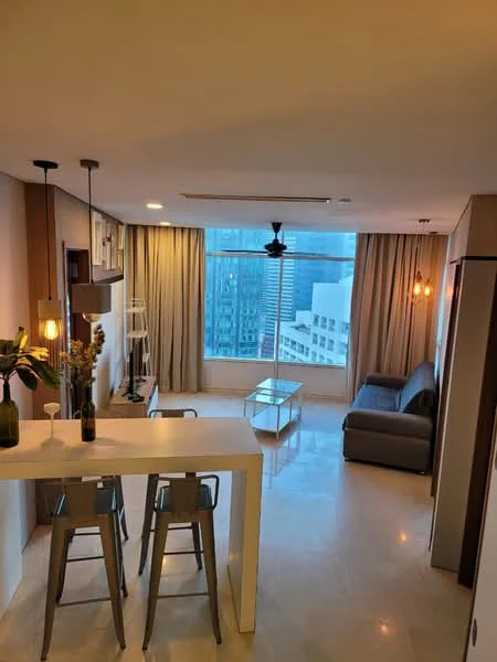 Living features: grey fabric sofa, glass coffee table, marble flooring, floor-to-ceiling windows, sheer curtains, 5-blade ceiling fan with light, pendant lighting, decorative vase with flowers, open shelving unit, bar counter with high stools; style: modern; view: city.