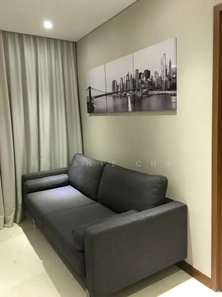 Living features: grey fabric sofa, wall-mounted artwork with city skyline, cream painted walls, floor-to-ceiling curtains, recessed ceiling lights, tile flooring; style: modern.