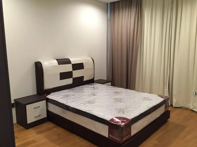 Bedroom features: king-size bed with upholstered headboard, nightstands on either side of the bed, white walls, floor-to-ceiling curtains, wooden flooring, decorative bedding, lamps on nightstands; style: modern.