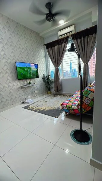 Living features: white painted walls, geometric patterned accent wall, polished ceramic tile flooring, 5-blade ceiling fan with light, recessed downlights, floor-to-ceiling windows, sheer curtains, blackout curtains, wall-mounted TV, TV console, area rug with geometric pattern, colorful patterned sofa, indoor plant; style: modern; view: city.