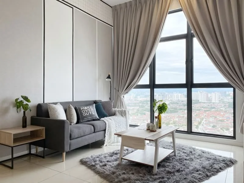Living features: grey fabric 3-seater sofa, decorative throw pillows, wooden side table, floor lamp, area rug with fluffy texture, large floor-to-ceiling window, curtains in light fabric, city skyline view, light-colored wall panels, polished tile flooring; style: modern; view: city.