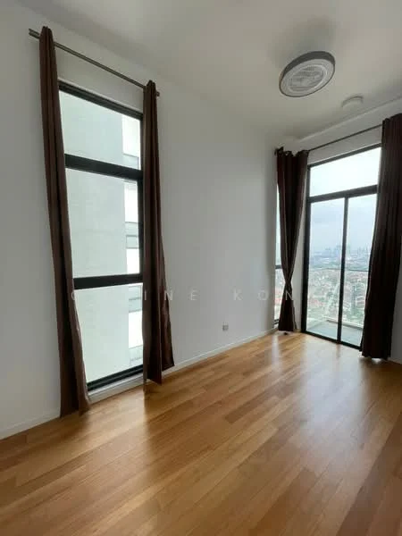Room features: large floor-to-ceiling windows, brown curtains, wooden flooring, white painted walls, ceiling light fixture; style: modern; view: city.