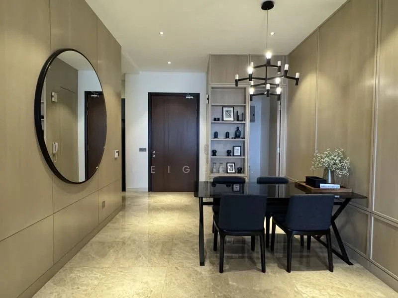 Dining features: marble tile flooring, wooden dining table, 4 black upholstered dining chairs, round mirror on wall, wall-mounted shelving unit, decorative items on shelves, chandelier with multiple arms, recessed downlights, neutral wall paneling, dark wood door, white walls; style: modern.