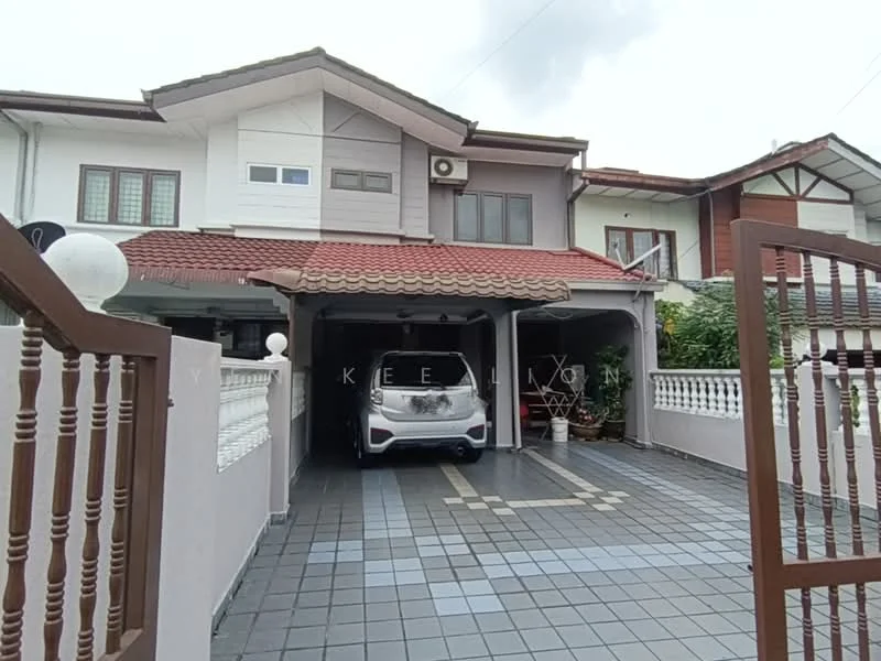 Exterior type: linked terrace house; features: two-storey building, red tiled roof, cream painted facade, front porch with tiled flooring, car porch with space for one vehicle, decorative white railing, landscaped area with potted plants, windows with grilles, visible air conditioning unit, gated entrance; style: modern.