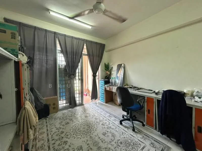 Room features: light grey walls, white ceiling, 5-blade ceiling fan, large window with sheer curtains, sliding glass door, decorative area rug with intricate pattern, wooden desk, office chair, full-length mirror, storage cabinets, potted plant, boxes stacked on top of cabinets; style: minimalist; view: garden.