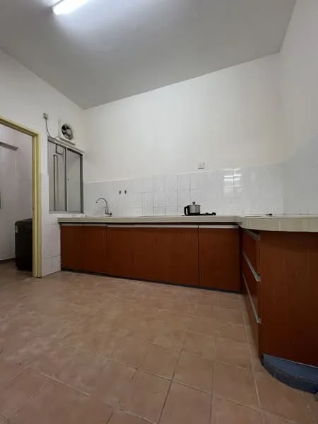 Kitchen features: L-shaped kitchen layout, brown wooden cabinetry, white tiled backsplash, single-bowl stainless-steel sink, chrome pull-down faucet, countertop with rounded edge, built-in gas hob, tile flooring in beige, exposed ceiling with fluorescent lighting, window for natural light, space for refrigerator, open layout; style: modern.