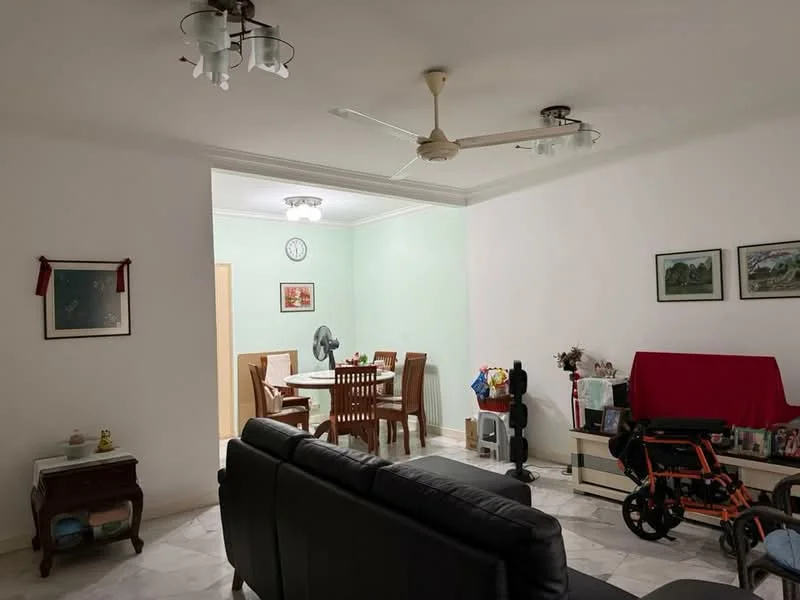 Living features: black leather sofa, marble flooring, 5-blade ceiling fan with light, wall-mounted clock, framed artwork on walls, decorative plant, TV console, open shelving, area rug; style: modern. Dining features: wooden dining table for 6, wooden dining chairs, light fixture above dining table, green painted walls; style: modern.
