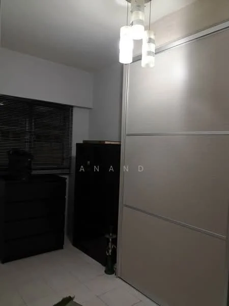 Room features: white walls, dark wood dresser, sliding wardrobe with light wood finish, ceiling light fixture with multiple bulbs, black cabinet, window with blinds, tile flooring; style: modern.