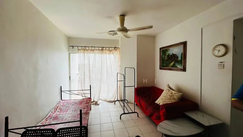 Living features: white painted walls, tile flooring, ceiling fan, sofa in red fabric, decorative pillow, framed artwork on wall, wall clock, curtains, folding bed frame, two small side tables.