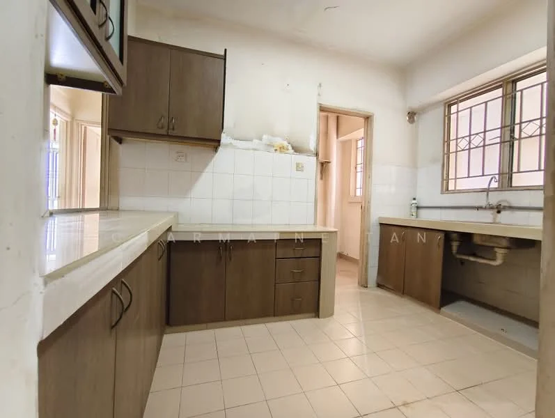 Kitchen features: brown wooden cabinetry, white tiled backsplash, white countertop, double-bowl stainless-steel sink, chrome faucet, built-in cabinets, tile flooring, window with metal grille, doorway leading to another room.