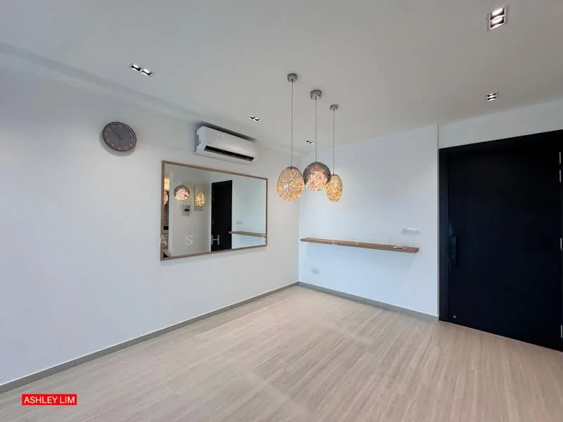 Room features: light wood flooring, white painted walls, recessed downlights, 3 pendant lights with decorative globes, wall-mounted mirror, air conditioning unit, clock on wall, shelf mounted on wall, black door; style: modern.