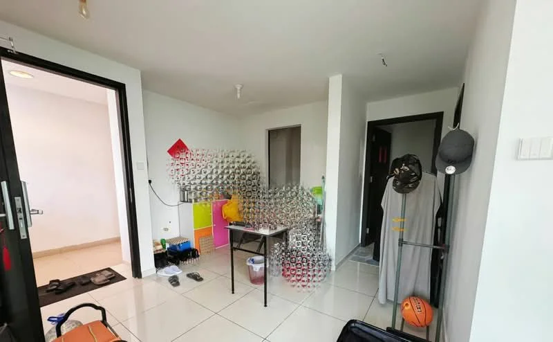 Room features: white painted walls, tile flooring, ceiling light fixture, doorway leading to hallway, doorway leading to another room, small table, plastic storage bins, fan, basketball, clothing rack; style: modern.