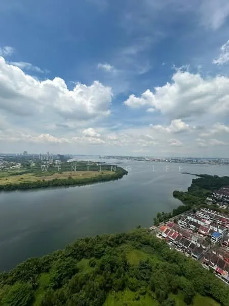 Exterior features: waterfront view, lush greenery, city skyline in distance, cloudy sky, river, residential buildings along the shore.