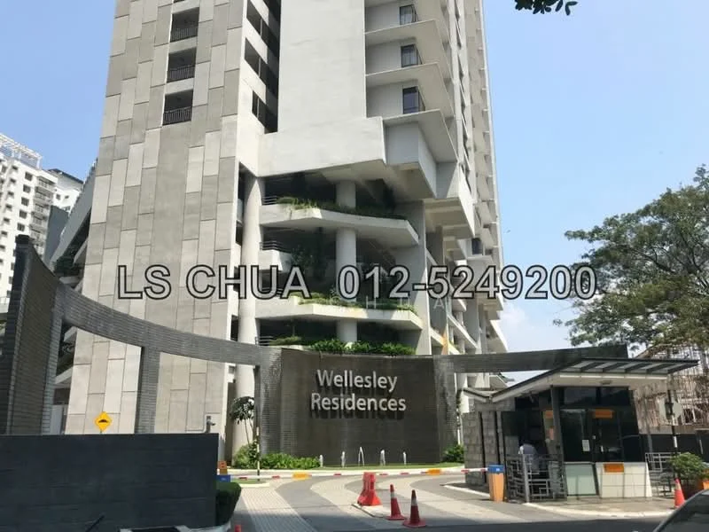 Exterior type: high-rise condominium; features: glass curtain wall, exposed concrete facade, recessed balconies, landscaped entrance, security guard house at entrance, driveway with interlocking pavers, surrounded by mature greenery; style: modern.