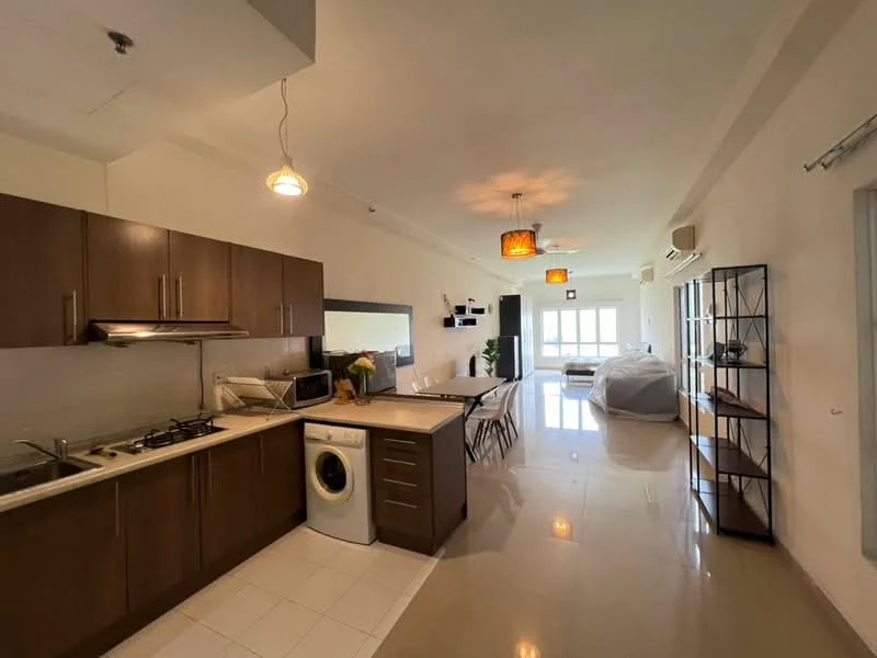 Kitchen features: brown wooden cabinetry, white countertop, stainless-steel sink, chrome pull-down faucet, 4-burner gas hob, built-in oven, microwave, front-load washing machine, tile backsplash, recessed downlights, ceramic tile flooring; style: modern. Living features: sofa, coffee table, TV console, wall-mounted TV, dining table with chairs, ceiling fan, area rug, large windows, air conditioning unit, decorative wall shelves; style: modern.