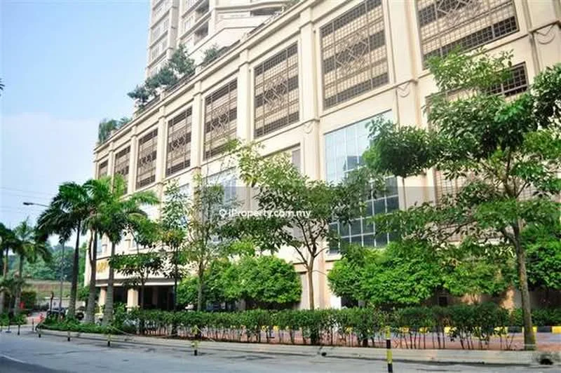 Exterior type: high-rise condominium; features: glass curtain wall, cream painted facade, recessed balconies, manicured lawn, mature trees, paved walkway, surrounded by greenery; style: modern.