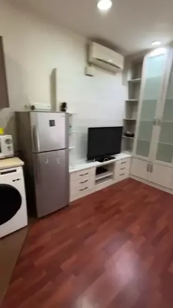 Room features: stainless-steel fridge, built-in TV cabinet, wall-mounted TV, white cabinetry, washing machine, wood laminate flooring, wall-mounted air conditioning unit, shelving unit, recessed lighting; style: modern.