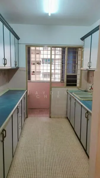 Kitchen features: blue laminate countertops, white cabinetry with handles, double-bowl stainless-steel sink, chrome faucet, wall-mounted cabinets, tile backsplash, grid-patterned floor tiles, window with metal grilles, door leading to balcony, fluorescent ceiling light.