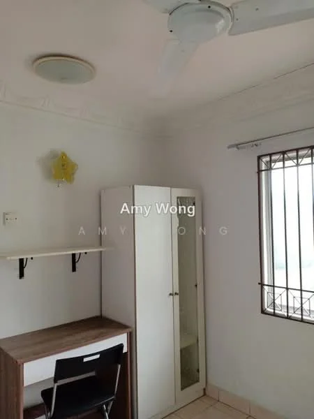 Room features: white painted walls, ceiling fan, light fixture on ceiling, window with metal grille, desk with chair, white cabinet with glass door, tile flooring.