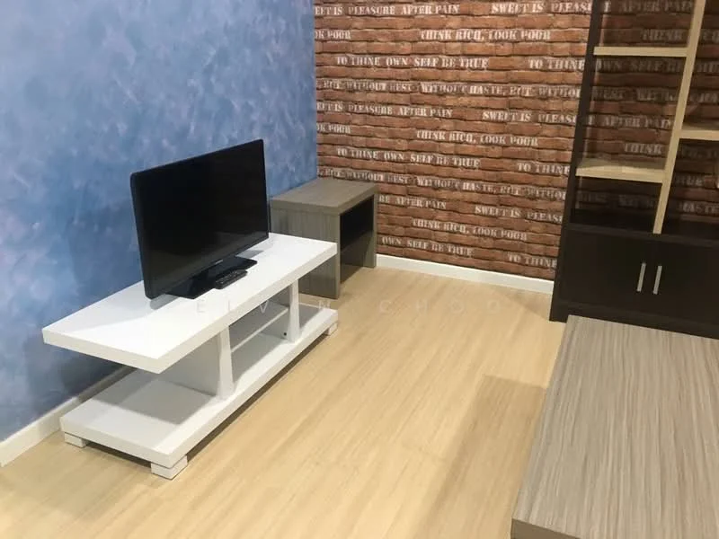 Living features: light wood laminate flooring, blue painted walls, accent wall with brick pattern, white TV console, black flat-screen TV, grey side table, open shelving unit, decorative wall paneling; style: modern.