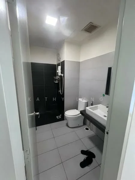 Bathroom features: grey tiled walls, black tiled accent wall, white sink, chrome basin mixer faucet, one-piece toilet, shower with glass enclosure, handheld shower, recessed ceiling lights, grey floor tiles, wall-mounted mirror, towel rail, sliding door, non-slip floor tiles; style: modern.