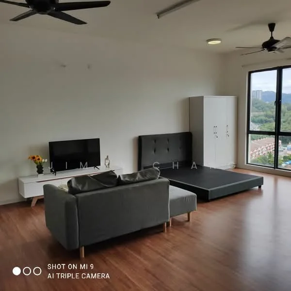 Living features: grey fabric sofa, black platform bed, white TV console, wall-mounted TV, wooden flooring, ceiling fan, large window with city view, decorative flowers in vase; style: modern; view: city.