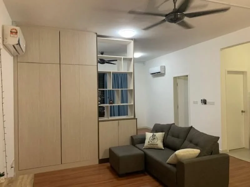 Living features: grey fabric sofa, sectional sofa, coffee table, built-in cabinetry with light wood finish, wall-mounted air conditioning unit, ceiling fan with light, wood laminate flooring, blue curtains, white painted walls, recessed ceiling lights; style: modern.