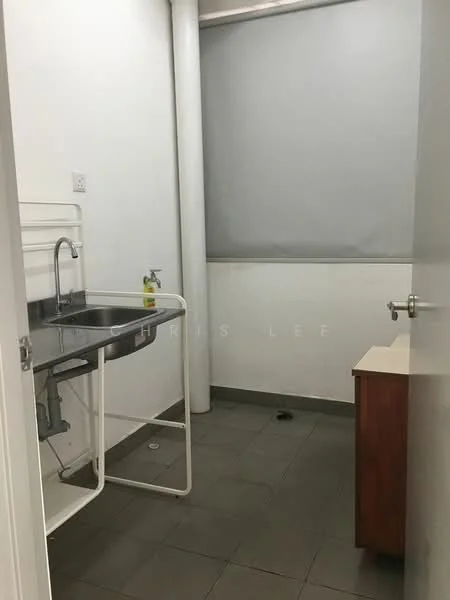 Laundry features: single-bowl stainless-steel sink, chrome faucet, white metal shelving unit, grey roller blinds, grey tiled flooring, white painted walls, wooden cabinet, drainage outlet on floor.