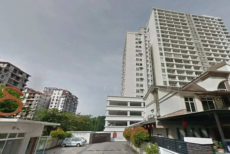Exterior type: high-rise condominium; features: glass curtain wall, white painted facade, multiple balconies, parking deck, surrounded by greenery, multi-storey car park, gated entry, guard house at entrance; style: modern.
