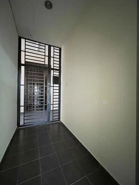 Room features: grey tiled flooring, white painted walls, metal security grille door, glass door, natural light from entrance; style: modern.
