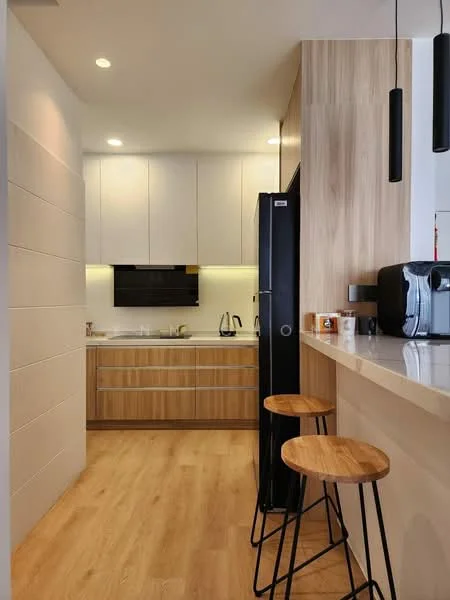Kitchen features: wood cabinetry, white upper cabinets, black built-in oven, stainless-steel sink, chrome pull-down faucet, countertop with bar seating, two wooden bar stools, refrigerator, light wood flooring, recessed downlights, white wall tiles, black kitchen appliances, open shelving; style: modern.