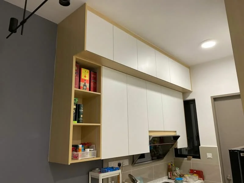 Kitchen features: white upper cabinets, wooden shelving, stainless-steel range hood, grey accent wall, light fixture, countertop, kitchen utensils, open shelving with storage baskets; style: modern.