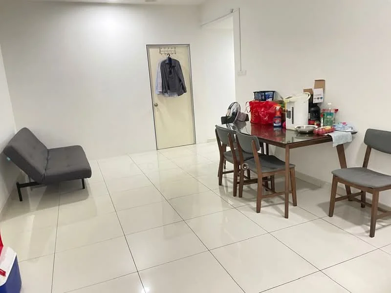 Dining features: white painted walls, glossy ceramic tile flooring, dining table with 6 wooden chairs, grey fabric sofa, door leading to another room, various food and drink items on the table, hanging coat on door, plastic containers on the table; style: modern.