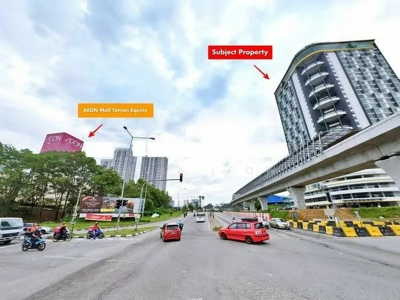 Exterior type: high-rise condominium; features: glass curtain wall, projecting balconies, surrounded by mature greenery, adjacent to highway, urban context, visible road infrastructure, multiple-storey building, nearby shopping mall, traffic lights, road signage; style: modern.