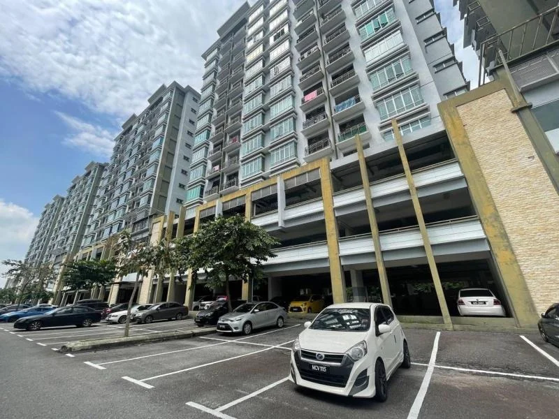 Exterior type: mid-rise condominium; features: multi-storey car park, ground-level parking, concrete facade, balconies on upper floors, landscaped greenery, surrounded by parking spaces, modern architectural design; style: modern.