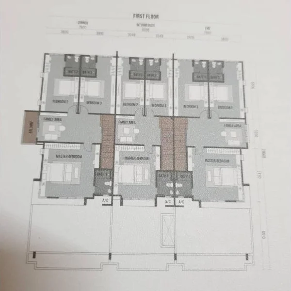 Floor plan: 4-bedroom 2-bathroom unit; features: open-plan kitchen-dining-living, master bedroom with ensuite bathroom, family area, utility room, balcony off living room, central foyer, 2 car porch, 1,500 sqft built-up.