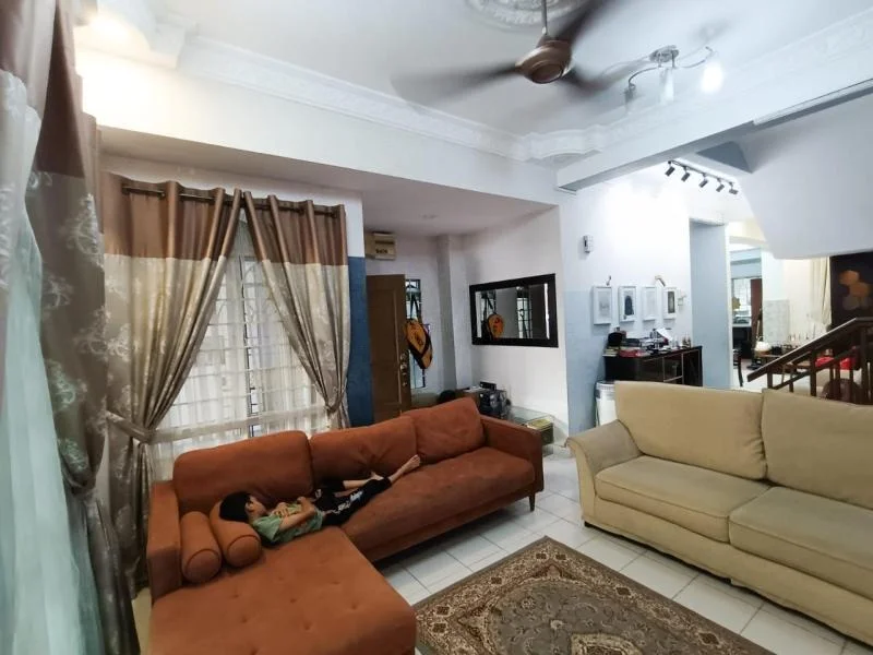 Living features: 3-seater fabric sofa in brown, 2-seater fabric sofa in beige, area rug with intricate pattern, ceiling fan with light, white painted walls with crown moulding, tile flooring, floor-to-ceiling windows with sheer curtains, decorative mirror, wall-mounted artwork, recessed lighting, curtains in beige and brown, coffee table; style: traditional.