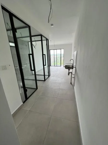 Room features: white painted walls, grey tile flooring, floor-to-ceiling windows, black framed glass doors, sink with wall-mounted faucet, exposed ceiling with electrical wiring, open layout, natural light from windows; style: modern; view: city.