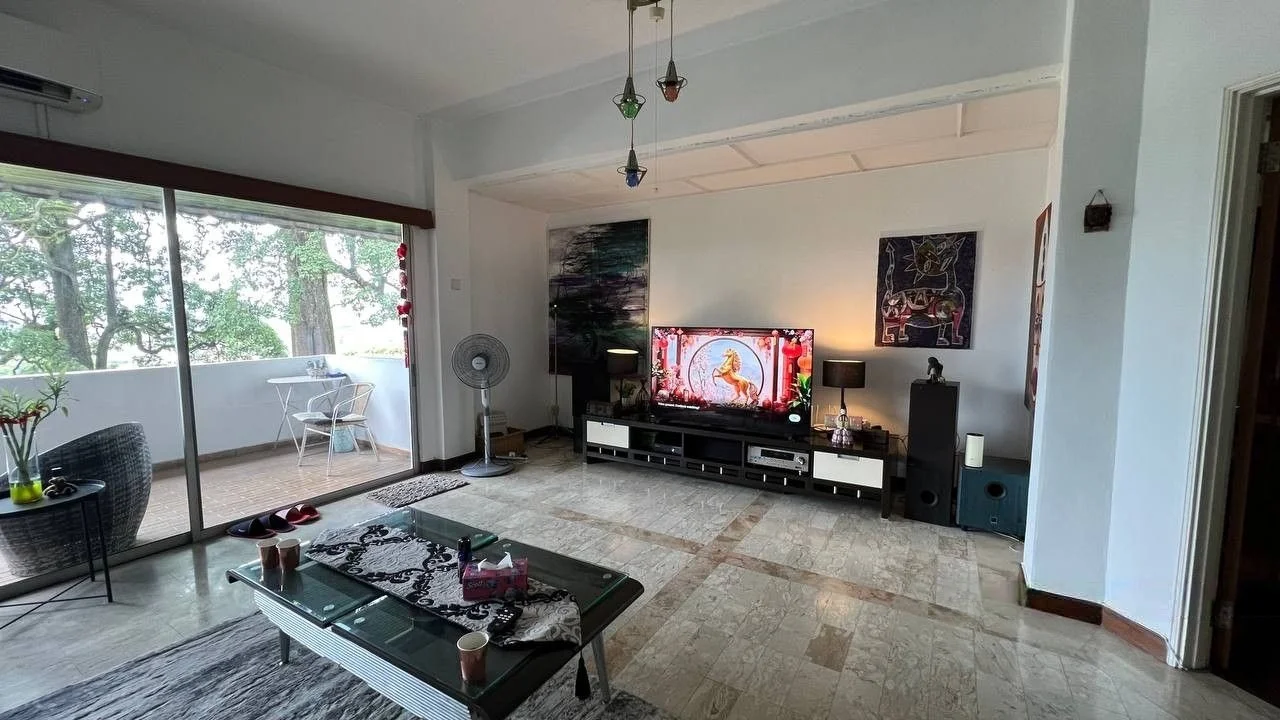 Living features: marble flooring, white painted walls, tray ceiling, floor-to-ceiling windows, sliding glass door, wall-mounted TV, black TV console, decorative artwork, ceiling fan, coffee table, area rug, decorative plants, outdoor balcony view; style: modern; view: garden.