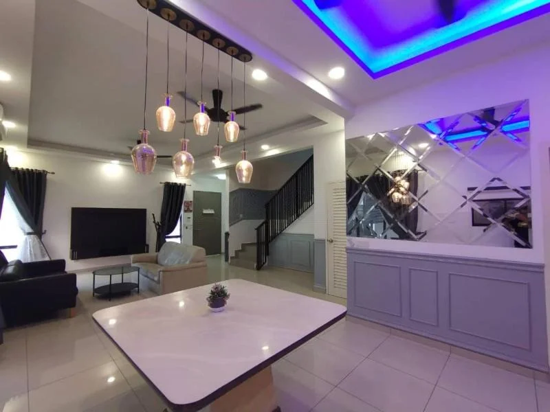 Living features: sofa in dark grey, light-coloured armchair, coffee table with white top, pendant lights with copper finish, recessed ceiling lights, tray ceiling with blue LED lighting, large wall mirror with diamond pattern, floor-to-ceiling windows with sheer curtains, wall-mounted TV, ceiling fan with light, tile flooring in light colour, decorative plant on table; style: modern.