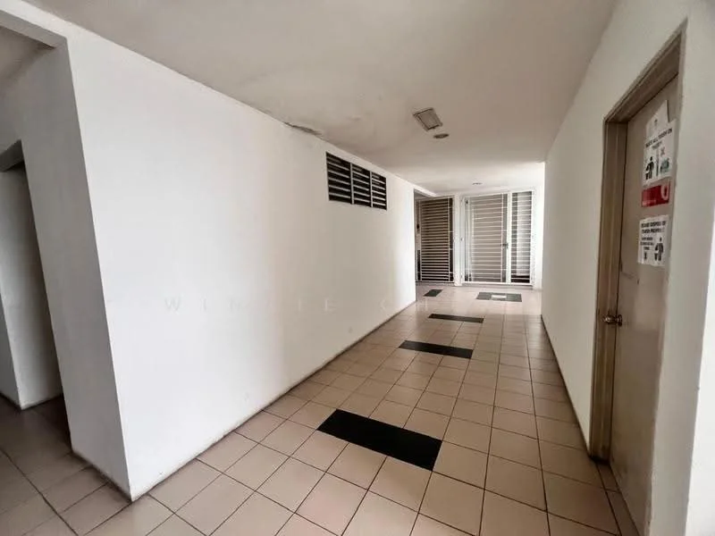Room features: white painted walls, tile flooring, black accent tiles, sliding glass doors, window with horizontal slats, light fixtures in ceiling, door to adjacent room, signage on wall.