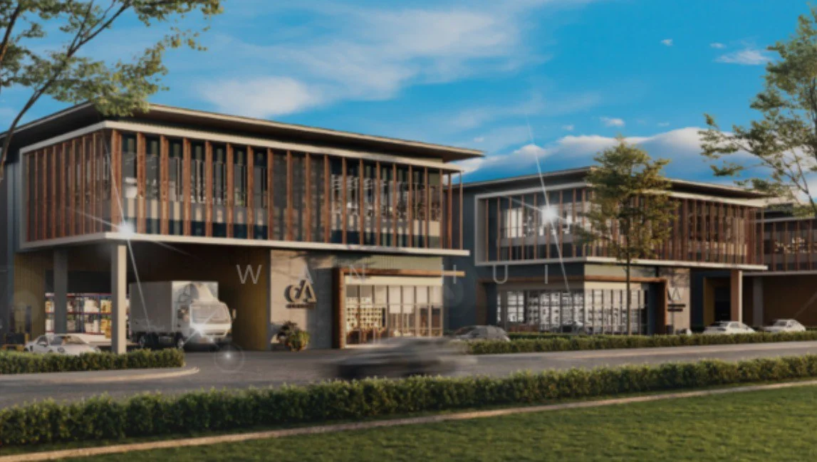 Exterior type: shophouse; features: modern facade with wooden slats, glass windows, two-storey structure, manicured landscaping, paved walkway, parking spaces visible, signage on building, surrounded by greenery; style: modern.