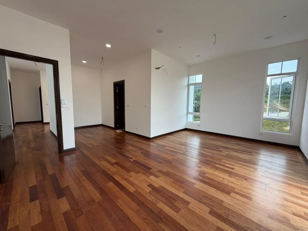 Room features: wooden flooring, white painted walls, large windows, natural light, ceiling lights, corner windows, open layout, no visible furniture; style: modern; view: garden.