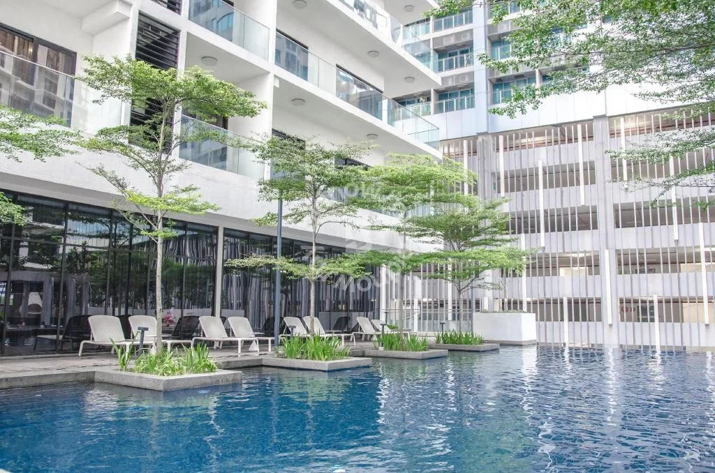 Exterior type: high-rise condominium; features: infinity pool, pool deck with loungers, landscaped garden with greenery, glass curtain wall facade, multiple storeys, surrounded by trees; style: modern.