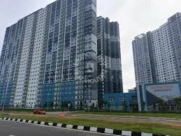 Exterior type: high-rise condominium; features: glass curtain wall, blue painted facade, multiple balconies, approximately 20-storey high-rise, surrounded by landscaped grounds, parking area visible, modern architectural design; style: modern.